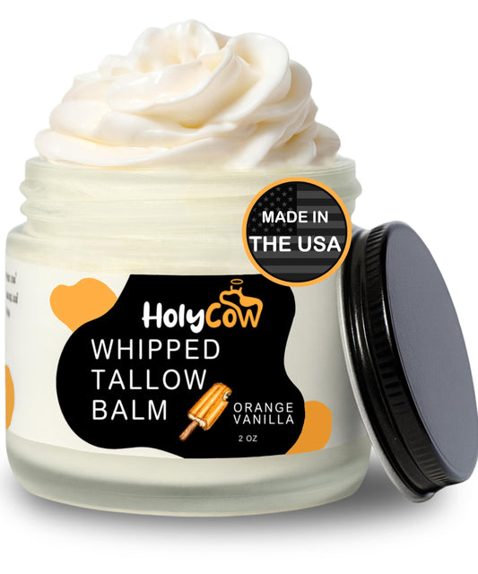 HolyCow whipped tallow balm jar with orange-vanilla scent for dry skin.