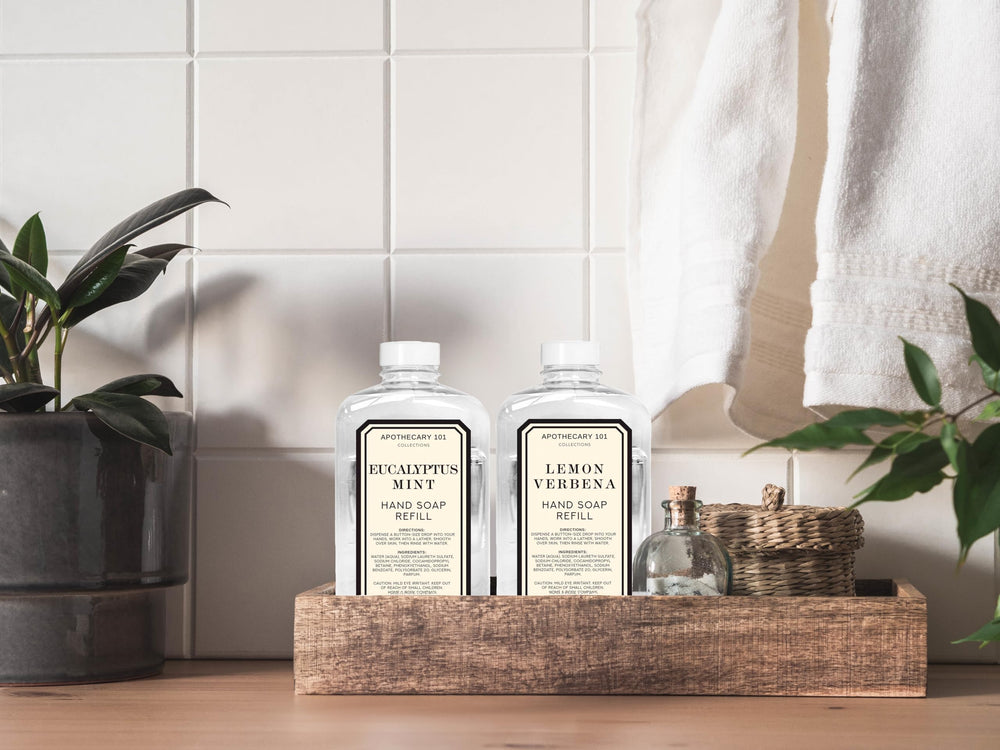 Home and Body Company Apothecary 101 Eucalyptus Mint refill bottle pouring for invigorating hands.