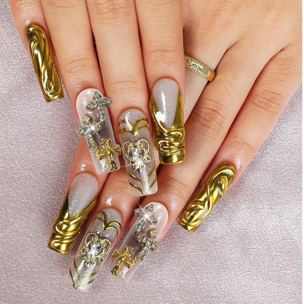 Homsera nails featuring 3D cross heart charms for a romantic statement