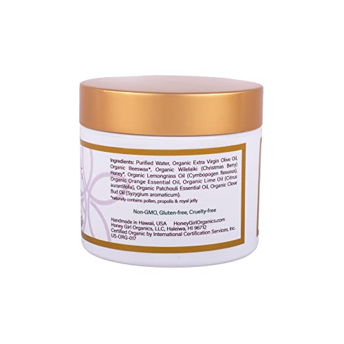 Honey Girl Organics Body Creme jar spread highlights beeswax and honey nutrients for hydration.