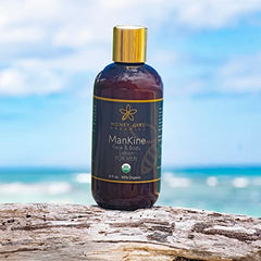 Honey Girl Organics ManKine label closeup showing certified organic ingredients.
