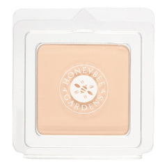 Honeybee Gardens pressed mineral foundation refill bottle closeup showing natural finish