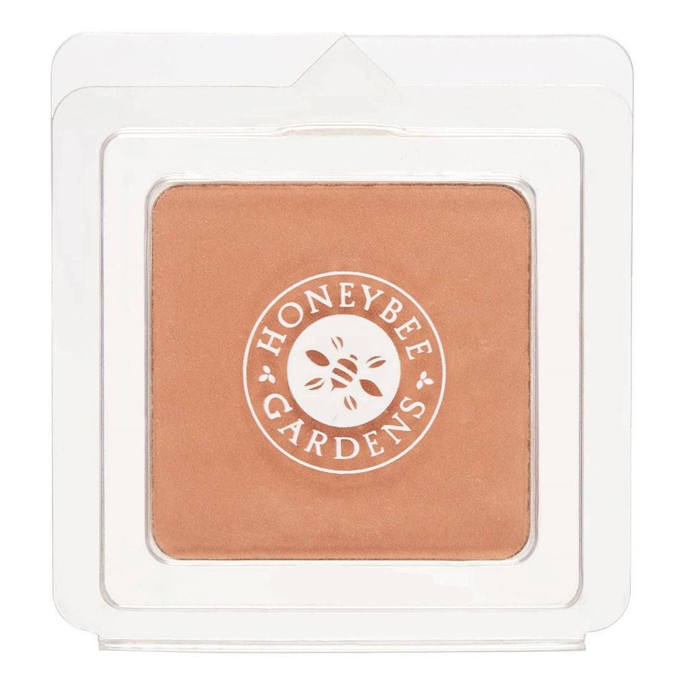 Honeybee Gardens pressed mineral foundation refill in Montego warm tan for on-the-go coverage.