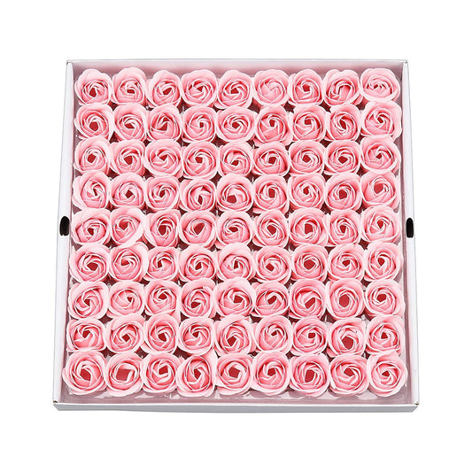 HOUSWEETY rose-petal bath soap dissolving in warm water for fragrance release.