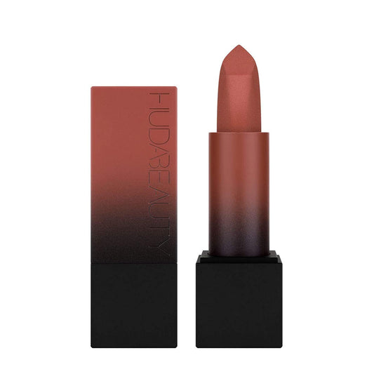 Huda Beauty Power Bullet Interview cap open shows rich color payoff for precise lip definition.