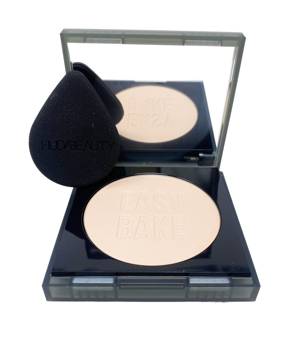 Open compact of Huda Easy Bake Peach Pie for on-the-go brightening and setting
