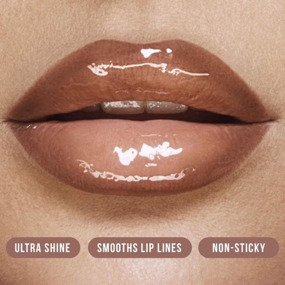 Huda Faux Filler Extra Shine Lip Gloss Glassy gloss-on lips with smooth texture.