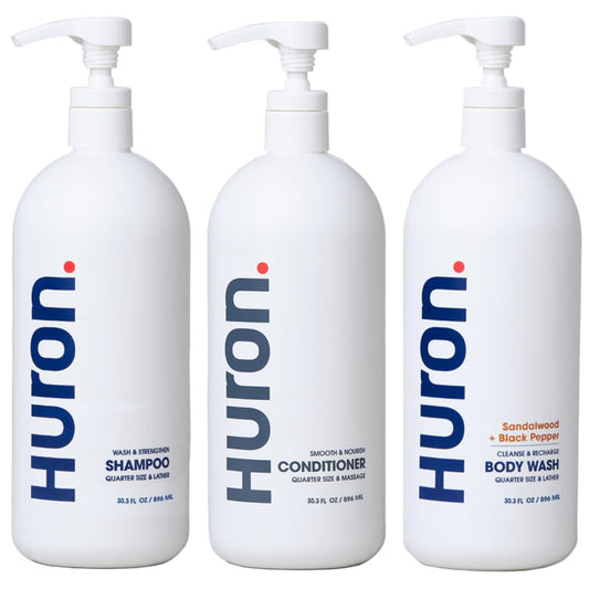 Huron jumbo shower kit shampoo bottle front showing hydrating cleansing for daily use