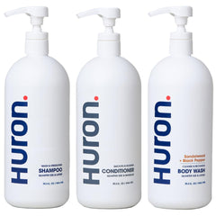 Huron jumbo shower kit shampoo bottle front showing hydrating cleansing for daily use