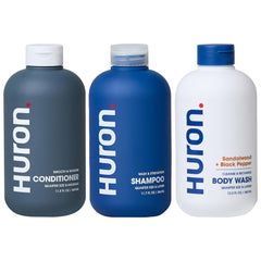 Huron Shower Kit shampoo bottle closeup for a hydrating cleanse