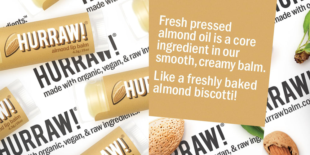 Hurraw Almond lip balm being applied for nourished, soft lips.