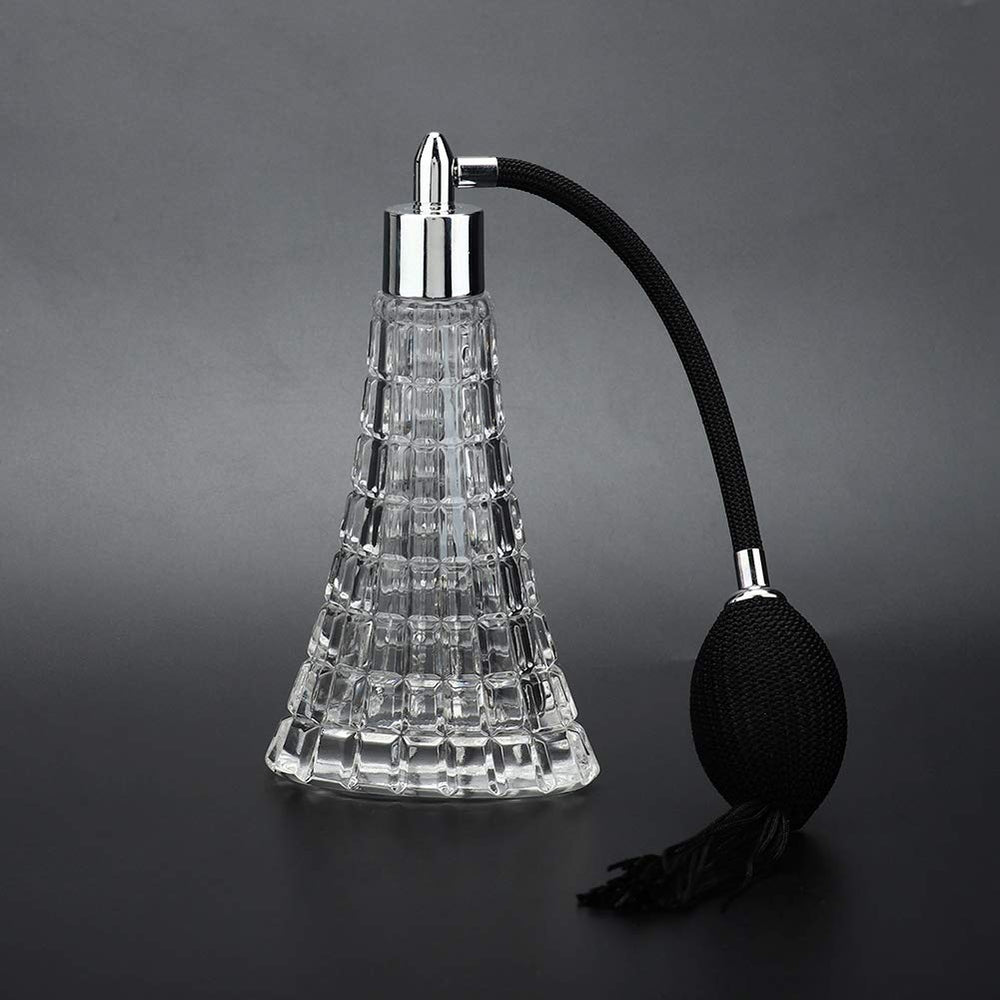 HURRISE vintage perfume bottle with tassel, a stylish travel-friendly fragrance container.
