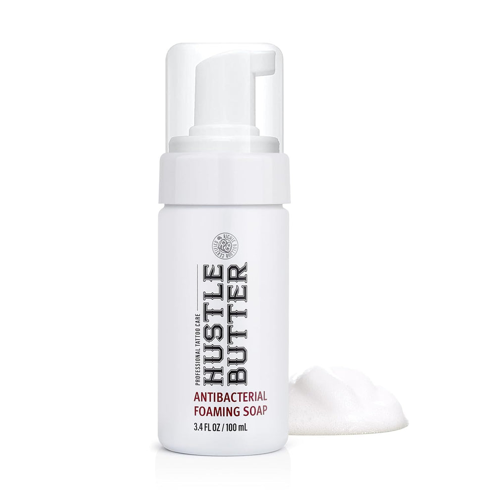 Hustle Bubbles tattoo soap bottle for gentle cleansing during healing.