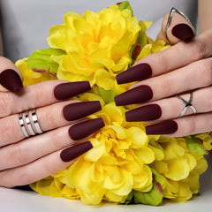 Hypnaughty maroon xtreme matte coffin nails with included glue for quick wear.
