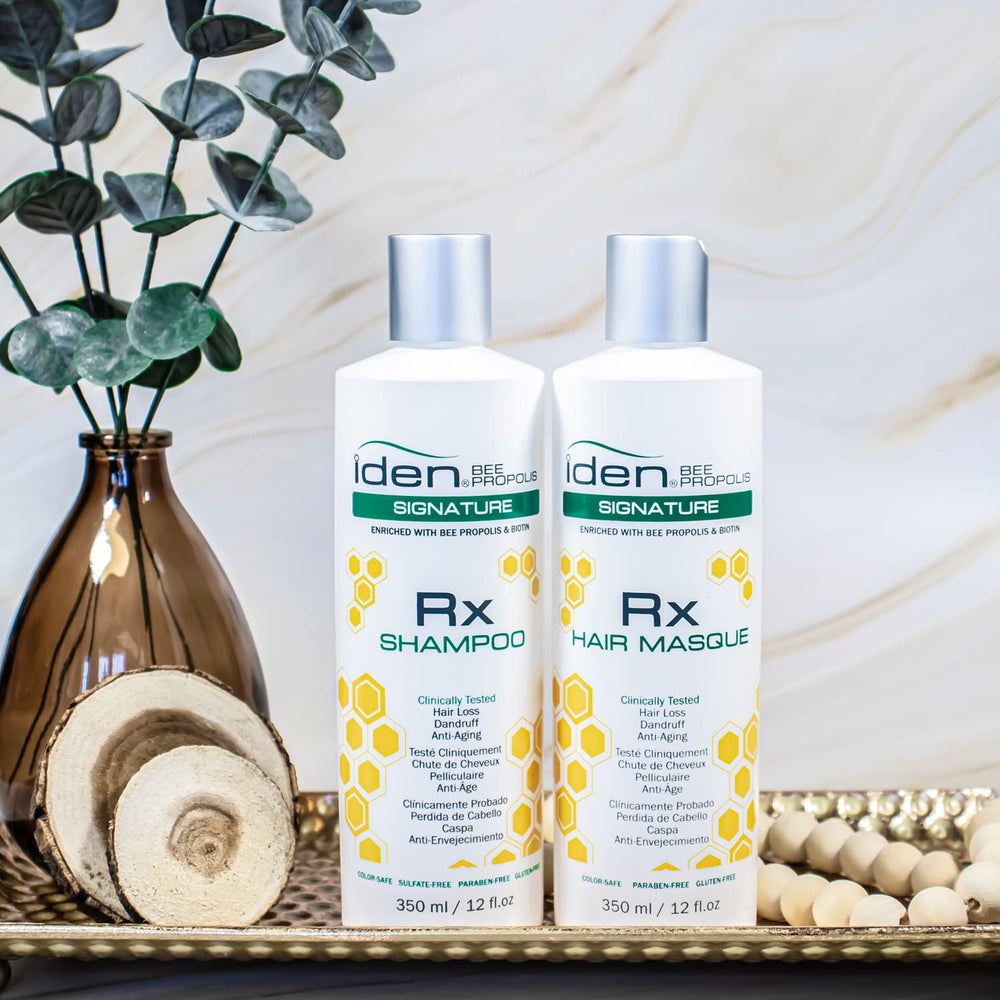 IDEN Bee Propolis Signature RX Shampoo bottle pour showing cleansing action for healthier hair