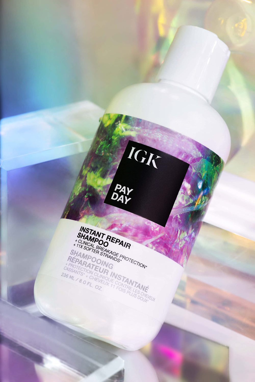 IGK Pay Day Shampoo cap close-up emphasizes premium packaging and dispensing.