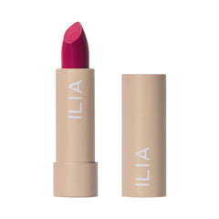ILIA Color Block Lipstick Knockout bullet close-up, rich magenta pigment and creamy glide.
