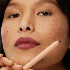 ILIA Lip Sketch Gala on lips illustrating even application and defined lip line.