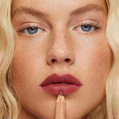 Packaging shot of ILIA Lip Sketch Gala emphasizes clean, non-toxic formula imagery.