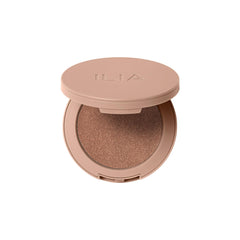ILIA Sunshift Cream Bronzer Eclipse on skin for seamless blend and lasting warmth.