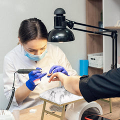 IMENE nail-table-mat keeps workspace tidy and protected during manicures.