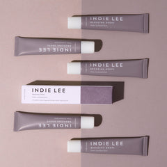 Indie Lee Bronzing Drops with Niacinamide and Squalane hydrates while evening skin tone.