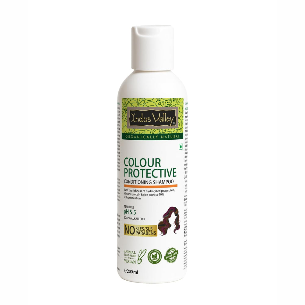 Indus Valley Colour Protective Shampoo bottle demonstrates color-safe cleansing for vibrant hair.