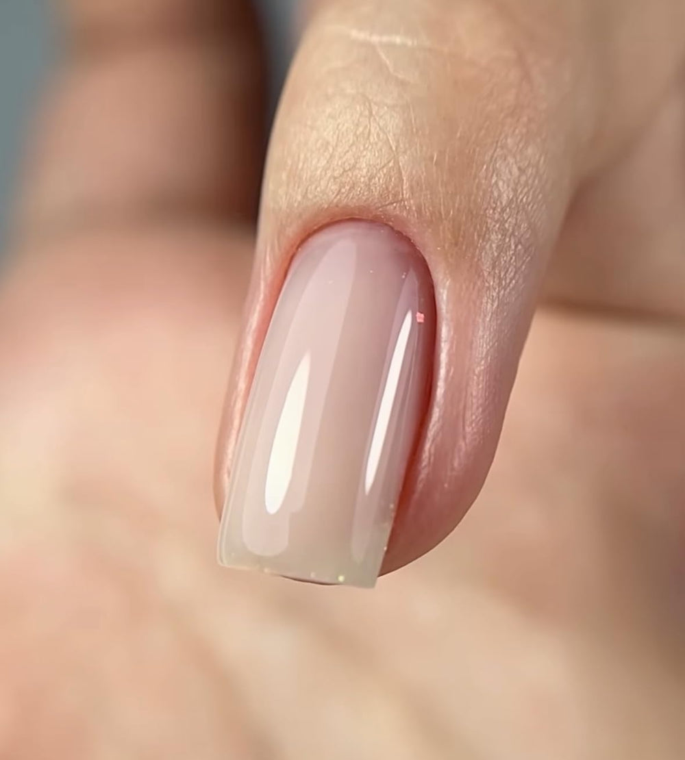 IN.HYPE Gel Top Coat Nude4 brush application showing smooth coating.