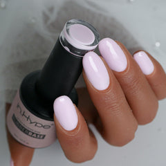 IN.HYPE N.HYPE rubber base coat applied to create a smooth apex for durable nail art.
