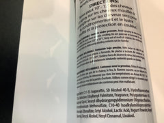 Inkursive Shuga Spray Leave-In Conditioner on a comb-ready hair close-up showing detangling