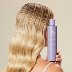 INNERSENSE Purple Shampoo foam close-up highlighting gentle cleansing