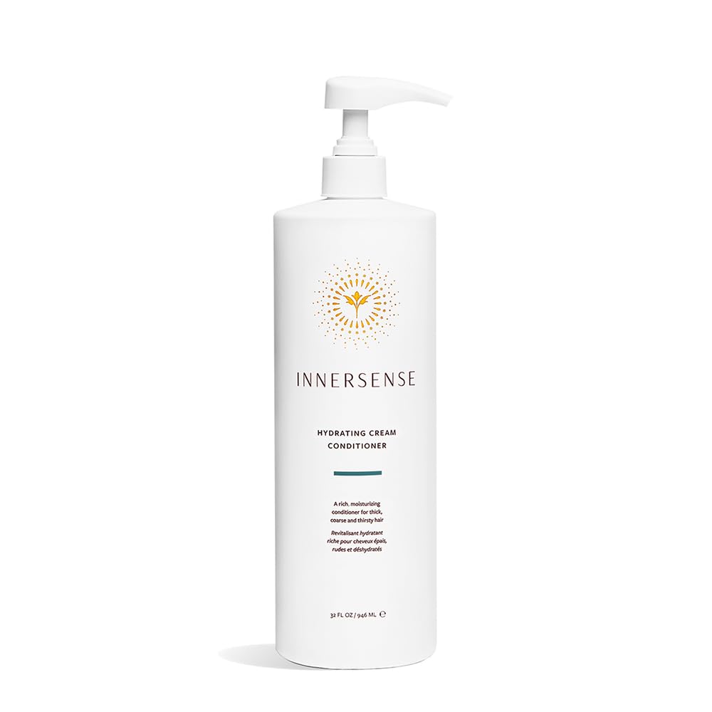 INNERSENSE Organic Hydrating Cream Conditioner bottle pouring for deep moisture in thick, coarse hair.