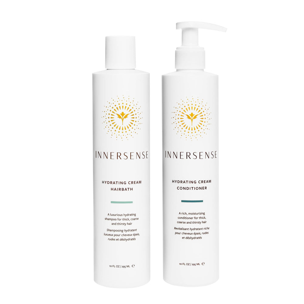 INNERSENSE Organic Hydrating Hairbath bottle pour, showcasing rich conditioning lather.