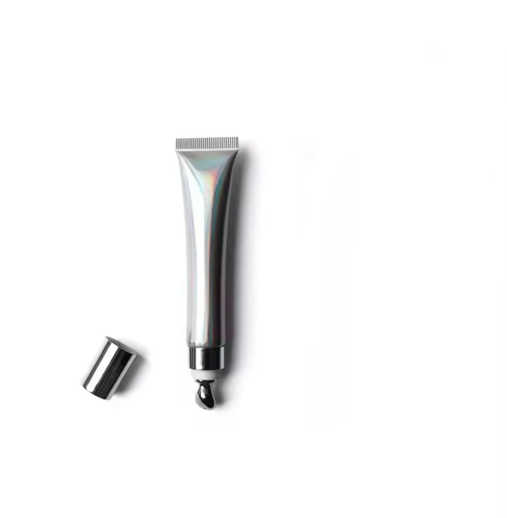 Intense Lip Plumper Gloss Crystal Clear bottle closeup showing plumping formula