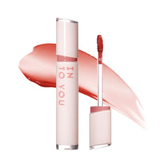 Into You Glow Lip Tint on lips with dewy, long-lasting color.