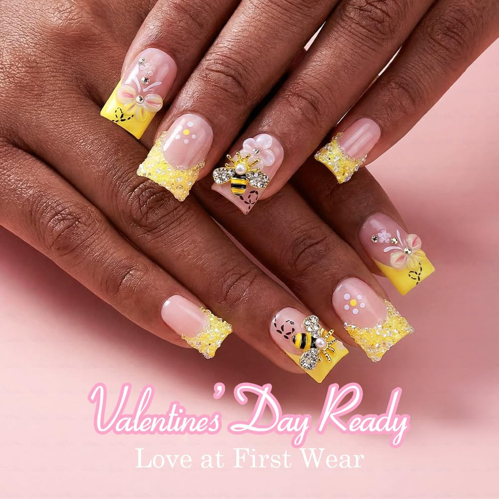 IntoVibes butter yellow press-on nails for a bold, glossy finish.