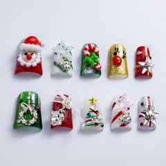IntoVibes Christmas duck nails in red and green for festive daily wear.