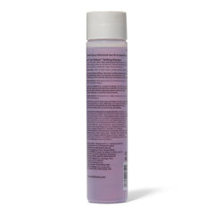 Ion Color Defense Clarifying Shampoo bottle close-up, vegan formula for color-treated hair.