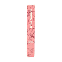 IRIS&ROMEO Weekend Skin Moisture Lip Balm shade swatch on lips showing medium tint.