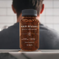 Isagenix Hair Revival bottle being poured to suggest convenient daily routine.