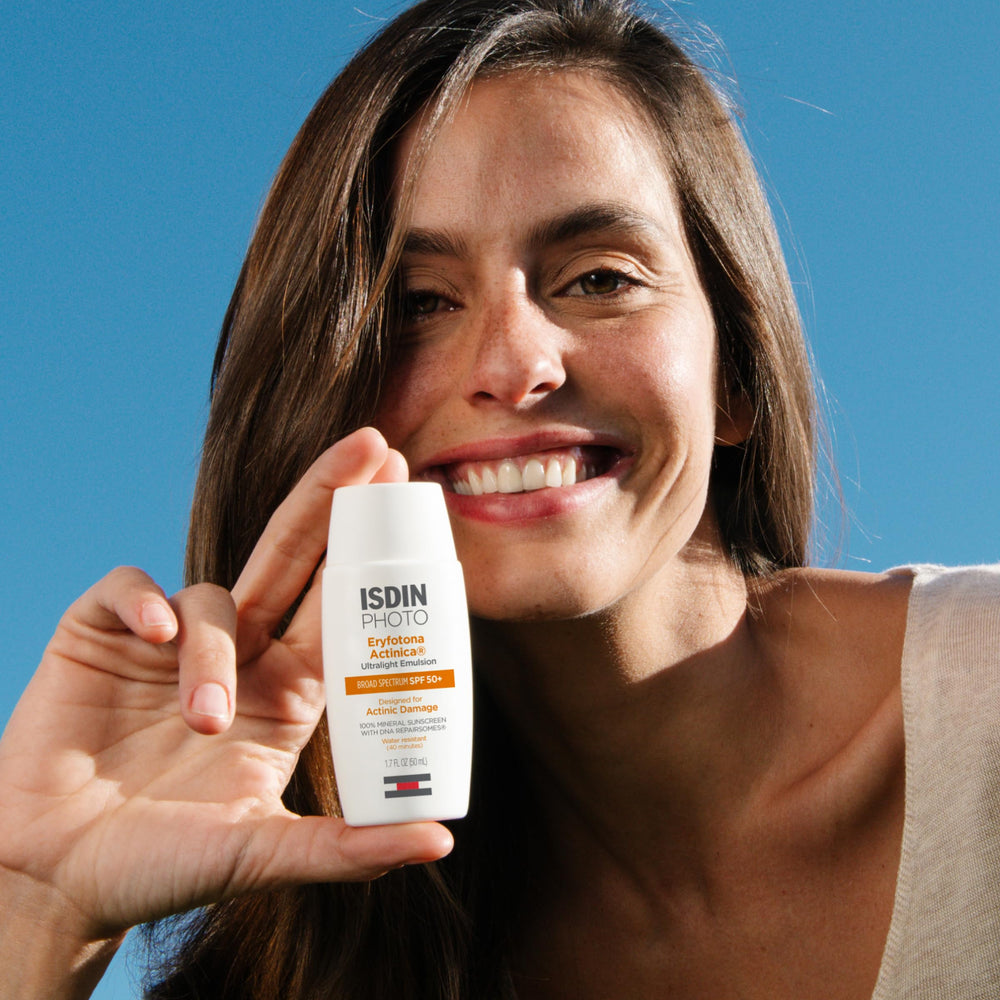Product packaging image emphasizes easy-to-carry travel-size sunscreen