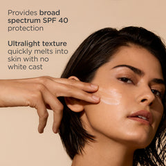 ISDIN Fusion Water MAGIC SPF 40 packaging on a bathroom shelf.