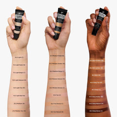 Applying IT Cosmetics Bye Bye Under Eye Concealer under-eye for brightened, smooth finish.