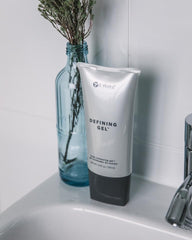 It Works! Defining Gel being massaged by hands for targeted contouring and absorption.