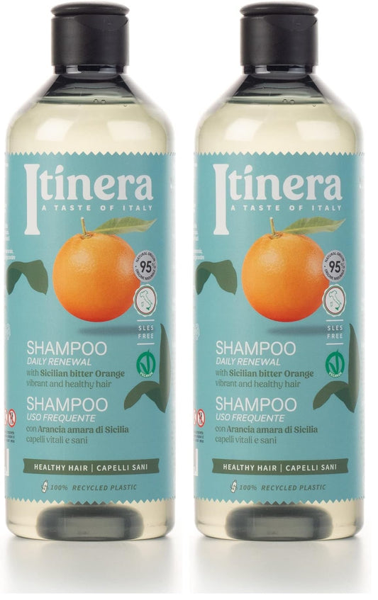 ITÍNERA Itinera Daily Renewal Shampoo bottle shows vegan, natural-origin formula for gentle cleansing.