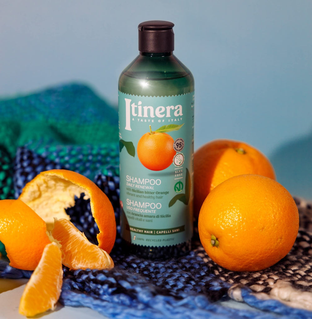 Highlight of natural-origin ingredients in ITÍNERA Itinera Daily Renewal Shampoo for vibrant hair.