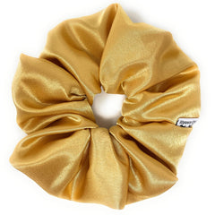 Iuptown Chic jumbo gold satin scrunchie for high ponytails.