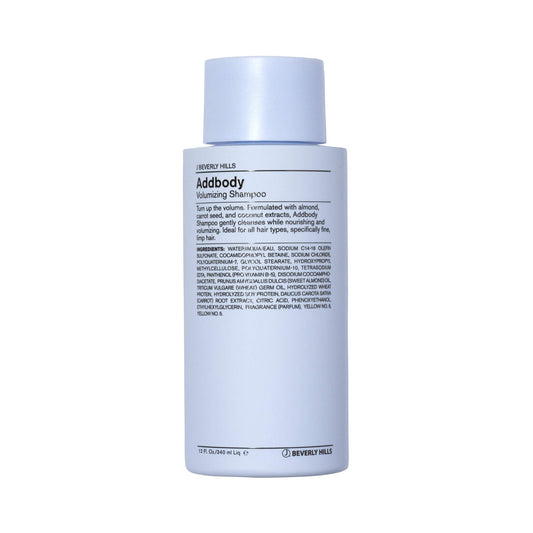 J Beverly Hills Blue Addbody Shampoo bottle highlighting volumizing formula.