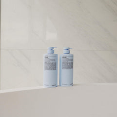 Close-up of blue malva highlights in J Beverly Hills formula for balanced blonde tones.