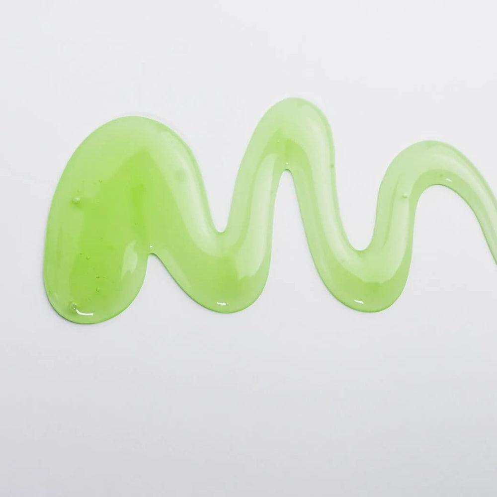 J Beverly Hills Men's Mint Shampoo label closeup highlights peppermint oil and cooling benefits.